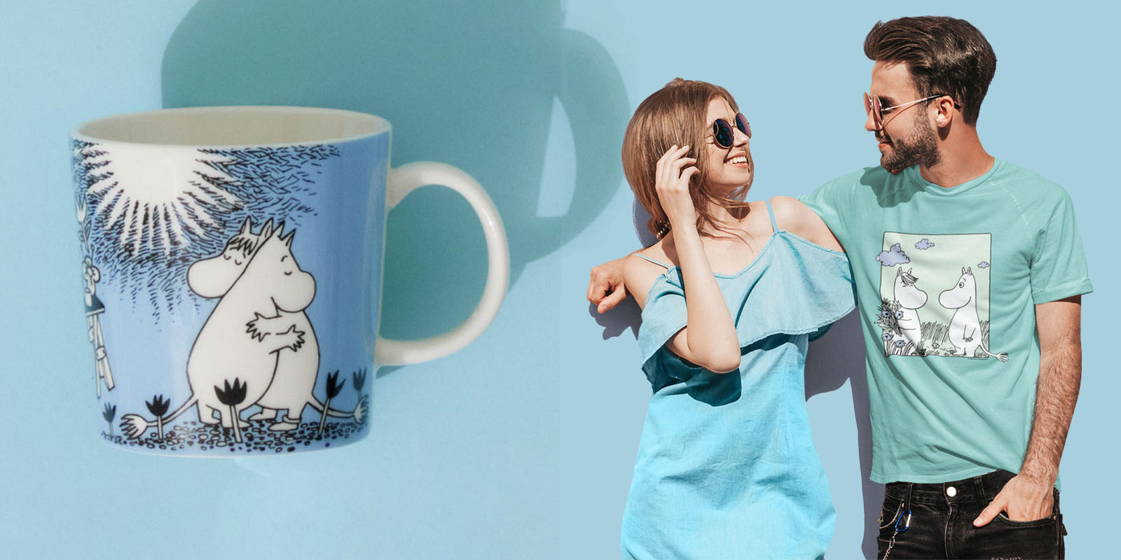A Moomin Arabia Blue Love Mug and a young couple wearing a Moomintroll and Snorkmaiden T-Shirt
