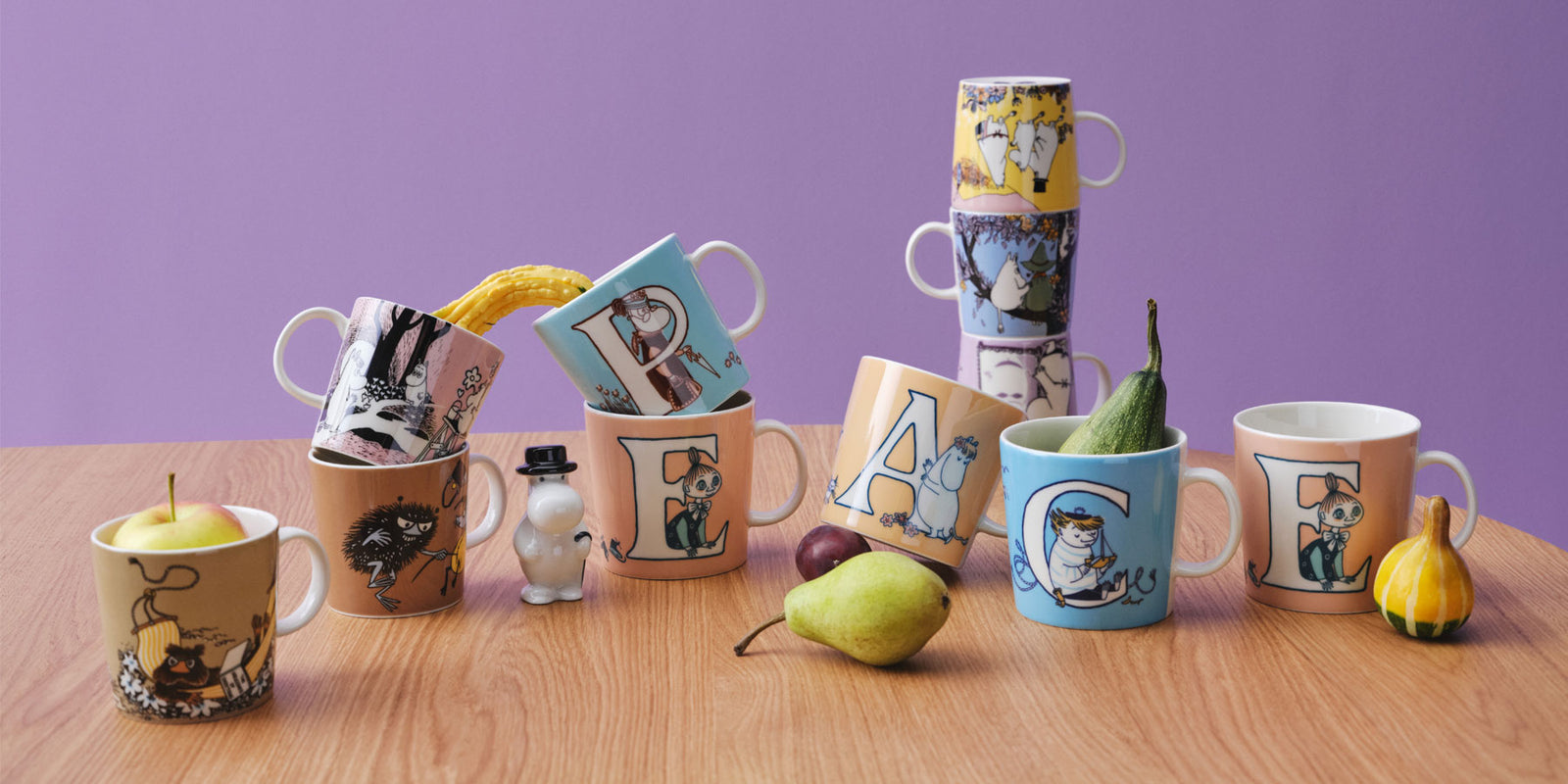 A selection of Moomin Arabia ceramic mugs